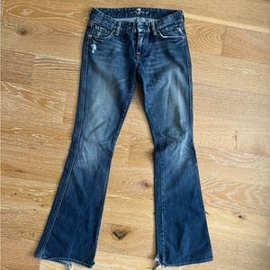 7 for all mankind, size 25, metal bead design on back pockets.